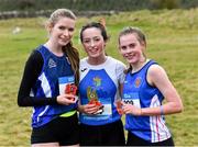 22 February 2023; Winner of the senior girls event Gracie O'Brien St Joseph's SS Castlebar in Mayo, centre, with Roisin Geaney of Seamount College Kinvara in Galway, left, who finished third, and Alix Joyce of Mercy Tuam in Galway, who finished second, during the 123.ie Connacht Schools’ Cross Country Championships at Bushfield in Loughrea, Galway. Photo by Piaras Ó Mídheach/Sportsfile