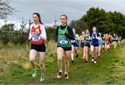 22 February 2023; Aisling Lane of Mercy Ballymahon in Longford, 266, and Cecelia Furey of Calasanctius College Oranmore in Galway, 41, in the senior girls event during the 123.ie Connacht Schools’ Cross Country Championships at Bushfield in Loughrea, Galway. Photo by Piaras Ó Mídheach/Sportsfile