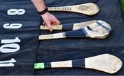 19 February 2023; Spare hurleys on the sideline before the Dillon Quirke Foundation Hurling Challenge match between Tipperary and Kilkenny at FBD Semple Stadium in Thurles, Tipperary. Photo by Piaras Ó Mídheach/Sportsfile