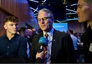 17 February 2023; Jarlath Burns is interviewed after he was voted-in as the GAA president elect, alongside his sons Conall, left, and Jarly Óg, during day one of the GAA Annual Congress 2023 at Croke Park in Dublin. Photo by Piaras Ó Mídheach/Sportsfile