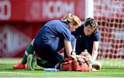 22 February 2023; Louise Quinn of Republic of Ireland receives medical attention from physiotherapist Angela Kenneally, right, and team doctor Siobhan Forman, left, during the international friendly match between China PR and Republic of Ireland at Estadio Nuevo Mirador in Algeciras, Spain. Photo by Stephen McCarthy/Sportsfile