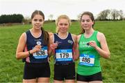 24 February 2023; Louise O'Mahony, centre, of Colaiste Muire, Ennis, Co Clare, after she won the Senior Girls race with second place Avril Millerick, left, from St Marys College, Midleton, Co Cork and third place Nicole Dinan from St Angela's College, Cork City during the 123.ie Munster Schools Cross Country Championships at SETU Waterford in Waterford. Photo by Matt Browne/Sportsfile