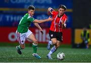 24 February 2023; Ollie O'Neill of Derry City in action against Cian Bargary of Cork City during the SSE Airtricity Men's Premier Division match between Derry City and Cork City at The Ryan McBride Brandywell Stadium in Derry. Photo by Ben McShane/Sportsfile