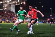 24 February 2023; Ben Doherty of Derry City in action against Darragh Crowley of Cork City during the SSE Airtricity Men's Premier Division match between Derry City and Cork City at The Ryan McBride Brandywell Stadium in Derry. Photo by Ben McShane/Sportsfile