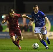 24 February 2023; Lee Devitt of Treaty United in action against Colm Horgan of Galway United during the SSE Airtricity Men's First Division match between Galway United and Treaty United at Eamonn Deacy Park in Galway. Photo by John Sheridan/Sportsfile