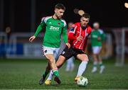 24 February 2023; Aaron Bolger of Cork City in action against Ryan Graydon of Derry City during the SSE Airtricity Men's Premier Division match between Derry City and Cork City at The Ryan McBride Brandywell Stadium in Derry. Photo by Ben McShane/Sportsfile