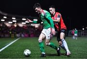 24 February 2023; Joshua Honohan of Cork City in action against Jordan McEneff of Derry City during the SSE Airtricity Men's Premier Division match between Derry City and Cork City at The Ryan McBride Brandywell Stadium in Derry. Photo by Ben McShane/Sportsfile