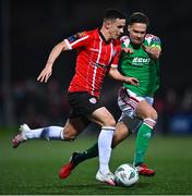 24 February 2023; Jordan McEneff of Derry City in action against Cian Coleman of Cork City during the SSE Airtricity Men's Premier Division match between Derry City and Cork City at The Ryan McBride Brandywell Stadium in Derry. Photo by Ben McShane/Sportsfile