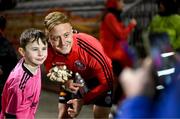 24 February 2023; Bohemians goalkeeper James Talbot poses for a photograph with a young Bohemians supporter before the SSE Airtricity Men's Premier Division match between Bohemians and Dundalk at Dalymount Park in Dublin. Photo by Stephen McCarthy/Sportsfile