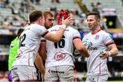 25 February 2023; Tom Stewart, 16, of Ulster celebrates with teammates after scoring his side's first try during the United Rugby Championship match between Cell C Sharks and Ulster at HollywoodBets Kings Park in Durban, South Africa. Photo by Darren Stewart/Sportsfile