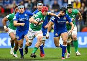25 February 2023; Josh van der Flier of Ireland evades the tackle of Juan Ignacio Brex of Italy during the Guinness Six Nations Rugby Championship match between Italy and Ireland at the Stadio Olimpico in Rome, Italy. Photo by Seb Daly/Sportsfile