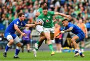 25 February 2023; Hugo Keenan of Ireland on his way to scoring his side's second try despite the efforts of Michele Lamaro, left, and Pierre Bruno of Italy during the Guinness Six Nations Rugby Championship match between Italy and Ireland at the Stadio Olimpico in Rome, Italy. Photo by Ramsey Cardy/Sportsfile