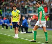 25 February 2023; Ireland water boy Joey Carbery watches on as Ross Byrne of Ireland prepares to kick a conversion during the Guinness Six Nations Rugby Championship match between Italy and Ireland at the Stadio Olimpico in Rome, Italy. Photo by Seb Daly/Sportsfile