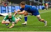 25 February 2023; Mack Hansen of Ireland dives over to score his side's fourth try during the Guinness Six Nations Rugby Championship match between Italy and Ireland at the Stadio Olimpico in Rome, Italy. Photo by Ramsey Cardy/Sportsfile