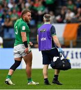 25 February 2023; Finlay Bealham of Ireland leaves the field with team doctor Ciaran Cosgrave after sustaining an injury during the Guinness Six Nations Rugby Championship match between Italy and Ireland at the Stadio Olimpico in Rome, Italy. Photo by Seb Daly/Sportsfile