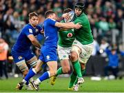 25 February 2023; Caelan Doris of Ireland is tackled by Paolo Garbisi of Italy during the Guinness Six Nations Rugby Championship match between Italy and Ireland at the Stadio Olimpico in Rome, Italy. Photo by Seb Daly/Sportsfile
