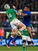 25 February 2023; Mack Hansen of Ireland contests a high ball with Pierre Bruno, middle, and Juan Ignacio Brex of Italy during the Guinness Six Nations Rugby Championship match between Italy and Ireland at the Stadio Olimpico in Rome, Italy. Photo by Seb Daly/Sportsfile