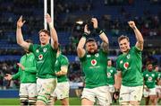 25 February 2023; Ireland players, from right, Josh van der Flier, Andrew Porter and Ryan Baird celebrate after their side's victory in the Guinness Six Nations Rugby Championship match between Italy and Ireland at the Stadio Olimpico in Rome, Italy. Photo by Seb Daly/Sportsfile