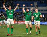 25 February 2023; Ireland players, from left, Ryan Baird, Andrew Porter and Josh van der Flier celebrate after their side's victory in the Guinness Six Nations Rugby Championship match between Italy and Ireland at the Stadio Olimpico in Rome, Italy. Photo by Seb Daly/Sportsfile