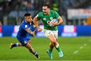 25 February 2023; James Lowe of Ireland makes a break during the Guinness Six Nations Rugby Championship match between Italy and Ireland at the Stadio Olimpico in Rome, Italy. Photo by Ramsey Cardy/Sportsfile