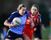 25 February 2023; Sinéad Wylde of Dublin in action against Roisin Flynn of Mayo during the 2023 Lidl Ladies National Football League Division 1 Round 5 match between Dublin and Mayo at DCU St Clare's in Dublin. Photo by Ray McManus/Sportsfile
