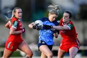 25 February 2023; Caoimhe O'Connor of Dublin in action against Fiona McHale and Ciara Needham of Mayo, left, of Mayo during the 2023 Lidl Ladies National Football League Division 1 Round 5 match between Dublin and Mayo at DCU St Clare's in Dublin. Photo by Ray McManus/Sportsfile