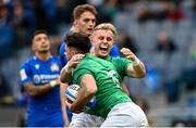 25 February 2023; Hugo Keenan of Ireland celebrates with teammate Craig Casey, right, after scoring their side's second try during the Guinness Six Nations Rugby Championship match between Italy and Ireland at the Stadio Olimpico in Rome, Italy. Photo by Ramsey Cardy/Sportsfile