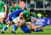 25 February 2023; Tom O'Toole of Ireland is tackled by Michele Lamaro, left, and Juan Ignacio Brex of Italy during the Guinness Six Nations Rugby Championship match between Italy and Ireland at the Stadio Olimpico in Rome, Italy. Photo by Ramsey Cardy/Sportsfile