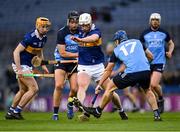 25 February 2023; Michael Breen of Tipperary kicks clear from John Bellew of Dublin, 17, during the Allianz Hurling League Division 1 Group B match between Dublin and Tipperary at Croke Park in Dublin. Photo by Piaras Ó Mídheach/Sportsfile