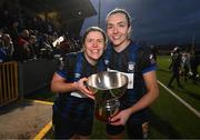 25 February 2023; Athlone Town captain Laurie Ryan, left, and team-mate Chloe Singleton celebrate with the FAI Women's President's Cup during the FAI Women's President's Cup match between Athlone Town and Shelbourne at Athlone Town Stadium in Athlone, Westmeath. Photo by Stephen McCarthy/Sportsfile