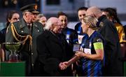 25 February 2023; Athlone Town captain Laurie Ryan is presented with her winners medal by President of Ireland Michael D Higgins after the FAI Women's President's Cup match between Athlone Town and Shelbourne at Athlone Town Stadium in Athlone, Westmeath. Photo by Stephen McCarthy/Sportsfile