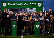 25 February 2023; Athlone Town captain Laurie Ryan is presented with the cup by President of Ireland Michael D Higgins after the FAI Women's President's Cup match between Athlone Town and Shelbourne at Athlone Town Stadium in Athlone, Westmeath. Photo by Stephen McCarthy/Sportsfile
