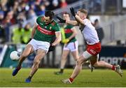 25 February 2023; Diarmuid O'Connor of Mayo in action against Frank Burns of Tyrone during the Allianz Football League Division 1 match between Mayo and Tyrone at Hastings Insurance MacHale Park in Castlebar, Mayo. Photo by Ben McShane/Sportsfile