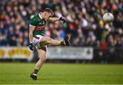 25 February 2023; James Carr of Mayo kicks a point from a free during the Allianz Football League Division 1 match between Mayo and Tyrone at Hastings Insurance MacHale Park in Castlebar, Mayo. Photo by Ben McShane/Sportsfile