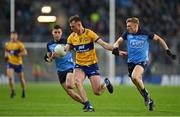 25 February 2023; Darragh Bohannon of Clare in action against Cian Murphy and Ross McGarry of Dublin during the Allianz Football League Division Two match between Dublin and Clare at Croke Park in Dublin. Photo by Stephen Marken/Sportsfile