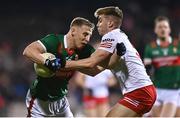 25 February 2023; Ryan O'Donoghue of Mayo is tackled by Cormac Quinn of Tyrone during the Allianz Football League Division 1 match between Mayo and Tyrone at Hastings Insurance MacHale Park in Castlebar, Mayo. Photo by Ben McShane/Sportsfile