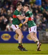 25 February 2023; James Carr of Mayo, right, celebrates with teammate Matthew Ruane after scoring their side's second goal during the Allianz Football League Division 1 match between Mayo and Tyrone at Hastings Insurance MacHale Park in Castlebar, Mayo. Photo by Ben McShane/Sportsfile