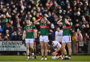 25 February 2023; Mayo players, from left, Paddy Durcan, Jordan Flynn and Jack Carney reacts to referee Noel Mooney's decision during the Allianz Football League Division 1 match between Mayo and Tyrone at Hastings Insurance MacHale Park in Castlebar, Mayo. Photo by Ben McShane/Sportsfile