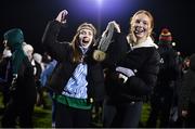 25 February 2023; Mayo supporters Hannah Sheridan, left, from Newport, Mayo, and Lucy Mulchrona, from Westport, Mayo celebrate after the Allianz Football League Division 1 match between Mayo and Tyrone at Hastings Insurance MacHale Park in Castlebar, Mayo. Photo by Ben McShane/Sportsfile