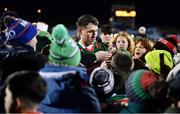 25 February 2023; Paddy Durcan of Mayo with supporters after his side's victory in the Allianz Football League Division 1 match between Mayo and Tyrone at Hastings Insurance MacHale Park in Castlebar, Mayo. Photo by Ben McShane/Sportsfile