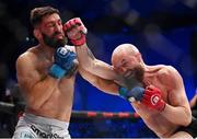 25 February 2023; Peter Queally, right, in action against Bryce Logan during their lightweight bout at Bellator 291 in the 3 Arena, Dublin. Photo by David Fitzgerald/Sportsfile
