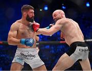 25 February 2023; Peter Queally, right, in action against Bryce Logan during their lightweight bout at Bellator 291 in the 3 Arena, Dublin. Photo by David Fitzgerald/Sportsfile