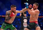 25 February 2023; Yaroslav Amosov, left, in action against Logan Storley during their welterweight title bout at Bellator 291 in the 3 Arena, Dublin. Photo by David Fitzgerald/Sportsfile