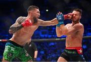 25 February 2023; Yaroslav Amosov, left, in action against Logan Storley during their welterweight title bout at Bellator 291 in the 3 Arena, Dublin. Photo by David Fitzgerald/Sportsfile