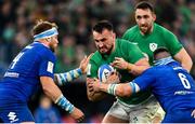 25 February 2023; Rónan Kelleher of Ireland is tackled by Niccolò Cannone, left, and Lorenzo Cannone of Italy during the Guinness Six Nations Rugby Championship match between Italy and Ireland at the Stadio Olimpico in Rome, Italy. Photo by Ramsey Cardy/Sportsfile