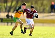 26 February 2023; Ian Burke of Galway in action against Mark Curran of Donegal during the Allianz Football League Division 1 match between Donegal and Galway at O'Donnell Park in Letterkenny, Donegal. Photo by Ben McShane/Sportsfile