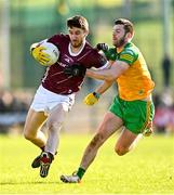 26 February 2023; Eoghan Kelly of Galway in action against Eoghan Ban Gallagher of Donegal during the Allianz Football League Division 1 match between Donegal and Galway at O'Donnell Park in Letterkenny, Donegal. Photo by Ben McShane/Sportsfile