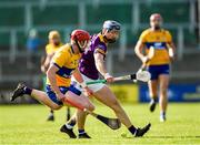 26 February 2023; Rory Higgins of Wexford in action against Paul Flanagan of Clare during the Allianz Hurling League Division 1 Group A match between Wexford and Clare at Chadwicks Wexford Park in Wexford. Photo by Ray McManus/Sportsfile