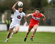 26 February 2023; Ben McCormack of Kildare in action against Conor Doherty of Derry during the Allianz Football League Division 2 match between Kildare and Derry at St Conleth's Park in Newbridge, Kildare. Photo by Piaras Ó Mídheach/Sportsfile