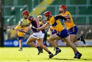 26 February 2023; Conor Hearne of Wexford is tackled by John Conlon and Peter Duggan of Clare, right, during the Allianz Hurling League Division 1 Group A match between Wexford and Clare at Chadwicks Wexford Park in Wexford. Photo by Ray McManus/Sportsfile
